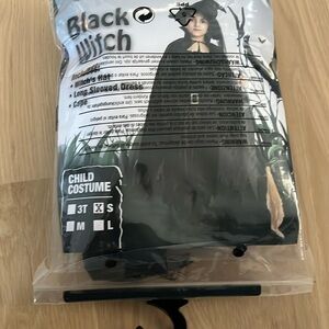 Worn once witches costume comes with hat and cape